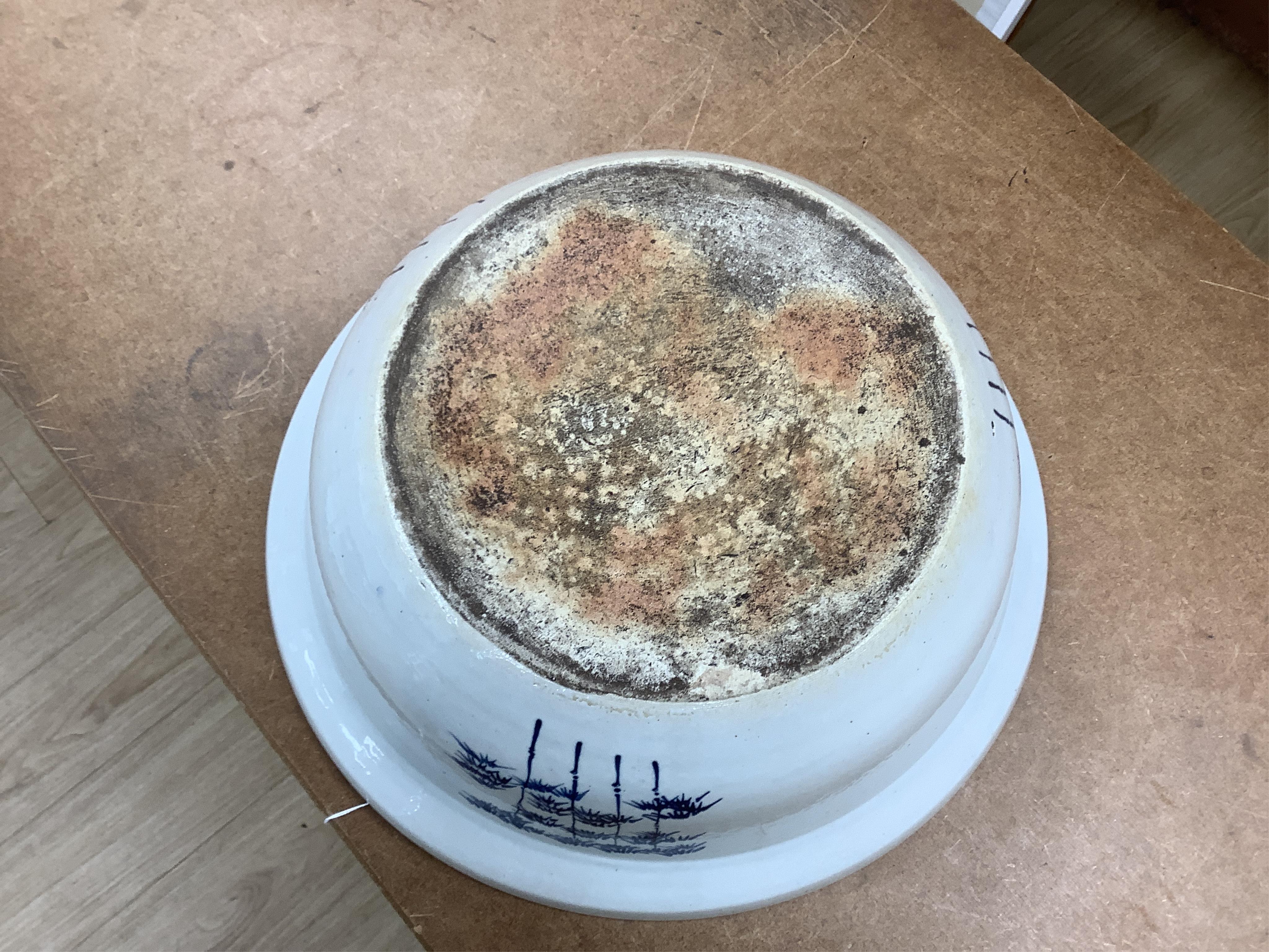 A large Chinese porcelain basin enamelled with figures, 41cm in diameter